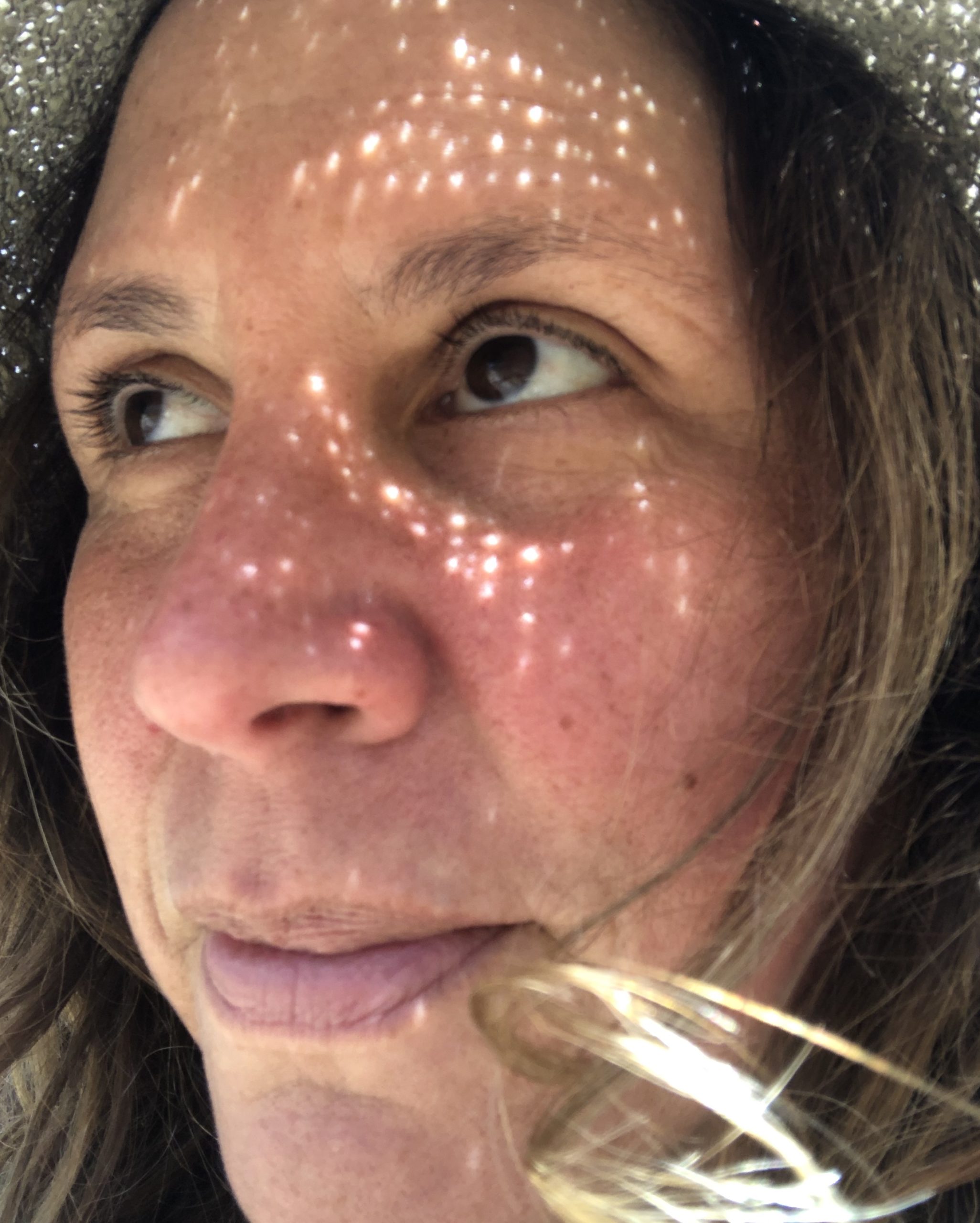 Client testimonial image featuring Ivana Ustariz, close-up with dappled sunlight on her face.