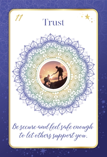 Kim Woods Magical Tools Intuition Oracle Card 11 - Trust Card from Kim Woods' Intuition Oracle deck titled 'Trust,' featuring a mandala design and an image of one person helping another up a rock.